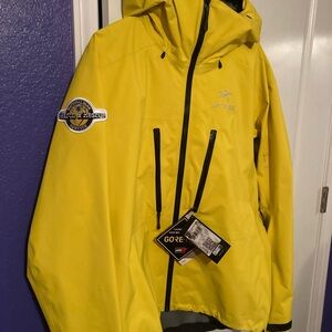 Arc'teryx Yellow Waterproof Shell Jacket with Black Zipper Accents
